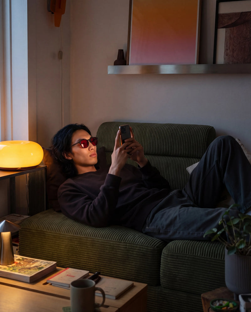 Customer wearing Kronveil glasses at home